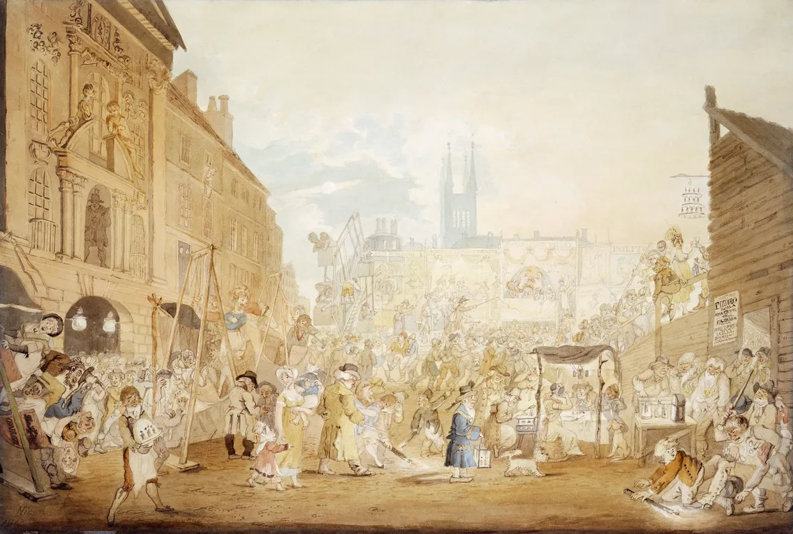 A busy street fair scene with numerous people engaging in various activities, market stalls, and buildings in the background, including a church with two spires.