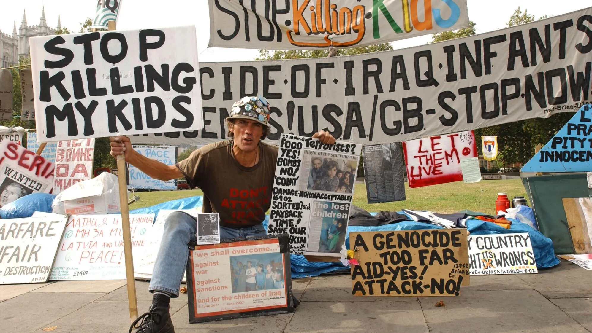 G633GA Anti War demonstrator Brian Haw, 53, from Redditch in Worcestershire on day 490 of his peace vigil opposite the House of Parliament, London. 31/03/2004: Anti-war demonstrator Brian Haw who has camped in Parliament Square for nearly three years and who said Wednesday March 31, 2004, he has been ordered to scale down his protest because police fear it is a terrorism threat. The 55-year-old father of seven, who sleeps on the pavement under a plastic sheet, has been threatened with legal action over his one man 1,035-day vigil opposite the Palace of Westminster. The Metropolitan Police argues