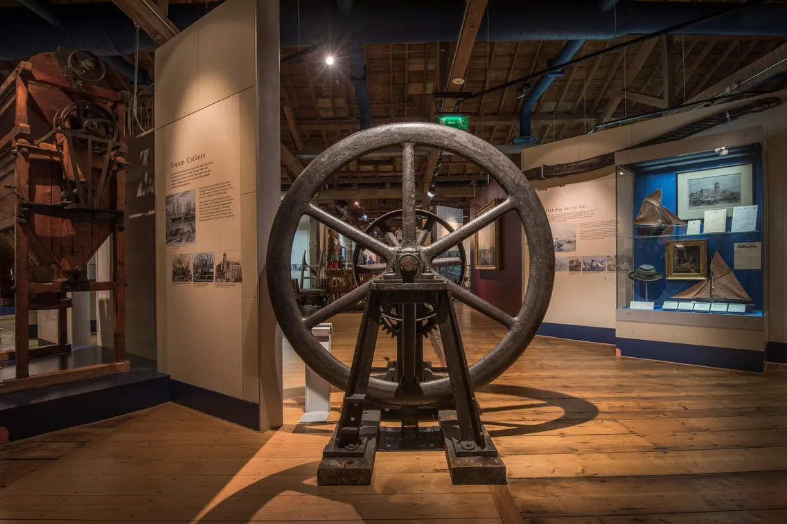A collection of  images depicting visitors enjoying themselves in the free-to-visit permanent galleries of the London Museum Docklands as well as its outdoor areas, café and shop.