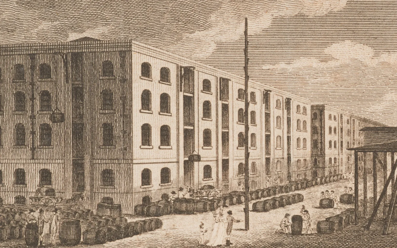A historical engraving depicts the London Docks, showing large warehouse buildings, people, barrels, and moored ships under a clouded sky.