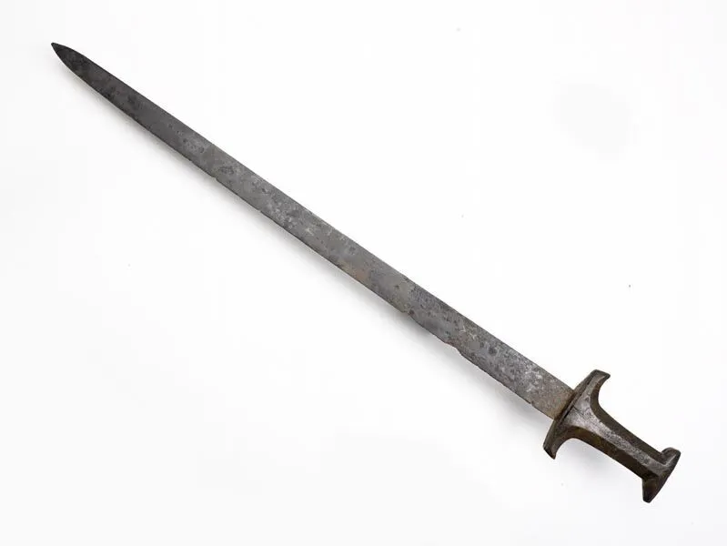 A medieval sword with a straight, double-edged blade and a simple crossguard, displayed against a white background.