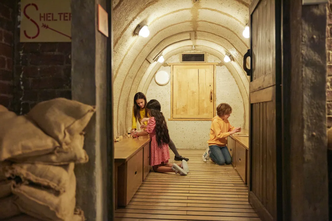A collection of  images depicting visitors enjoying themselves in the free-to-visit permanent galleries of the London Museum Docklands as well as its outdoor areas, café and shop.