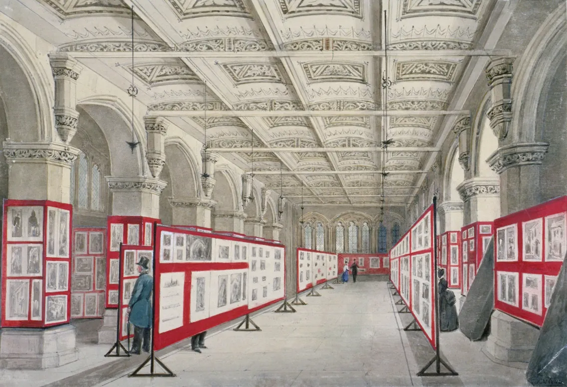 Guildhall Museum with vaulted ceilings displays framed artworks on red panels. Visitors in 19th-century attire are viewing the pieces. The room has an ornate design with arches and large windows.