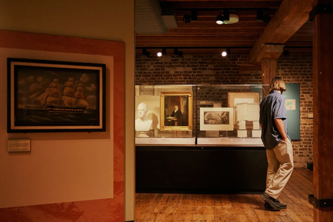 A collection of  images depicting visitors enjoying themselves in the free-to-visit permanent galleries of the London Museum Docklands as well as its outdoor areas, café and shop.