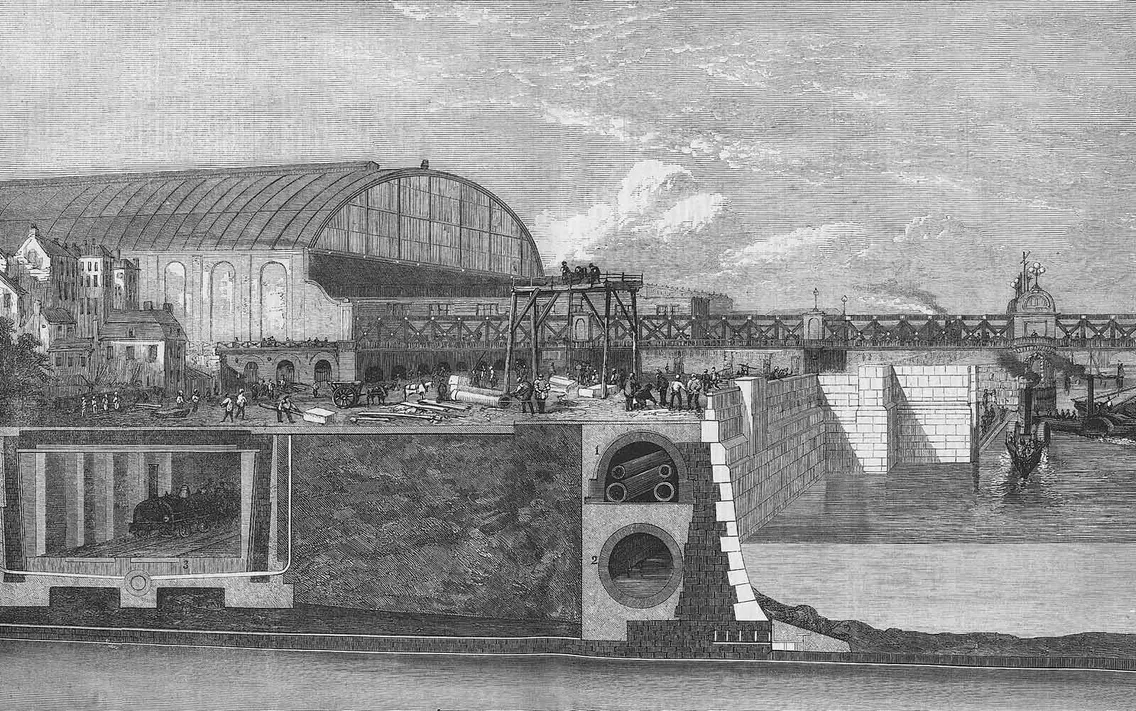 A detailed illustration of a 19th-century construction site with an arch-roofed building in the background and workers operating near a bridge, with visible underground tunnels and structures.